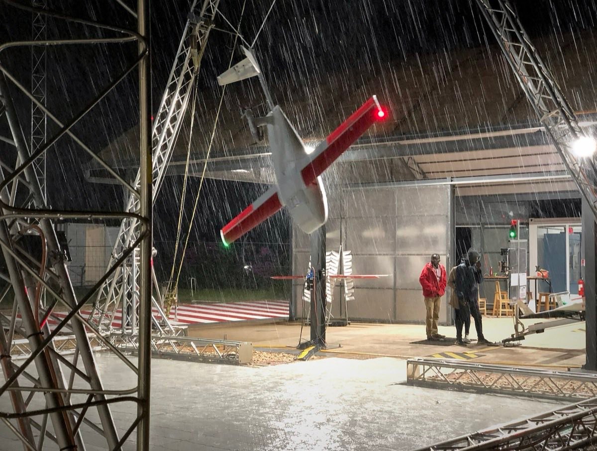 A Zipline drone landing in a night-time rainstorm in Rwanda